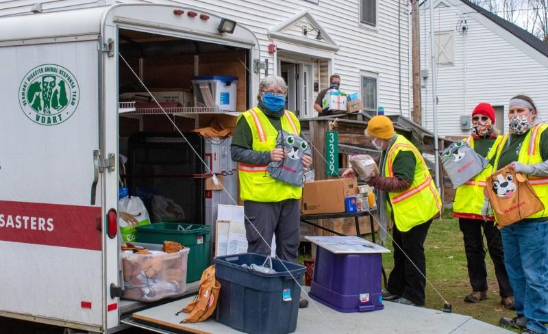 Central Vermont Disaster Animal Response Team volunteers sharing supplies during the COVID-19 pandemic